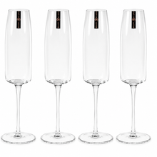 Load image into Gallery viewer, Set of four clear Katie Jayne Amphitrite Champagne Flutes with black & gold branded stickers on a white background.