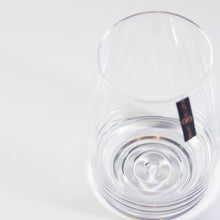Load image into Gallery viewer, Amphitrite highball tumbler glass showcasing wave-effect design and modern silhouette.