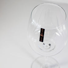 Load image into Gallery viewer, Mouth-Blown clear wine glass from the Katie Jayne Amphitrite range showcasing its elegant design and artisan craftsmanship.
